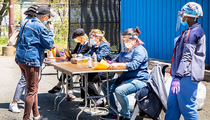 Mass General Brigham staff working in the community