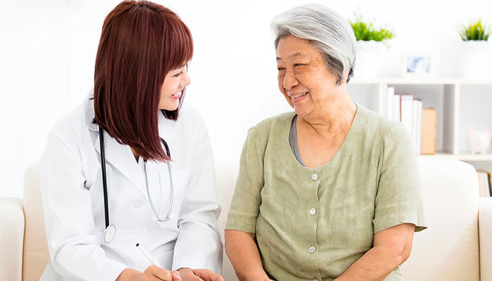 A doctor talks with a patient