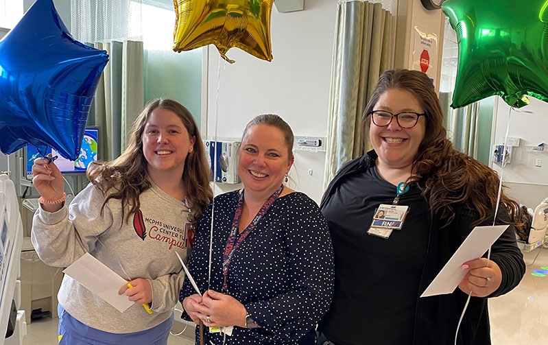 Nurses Tess Moore, Jen Walsh and Jess Loescher with their I CARE Award