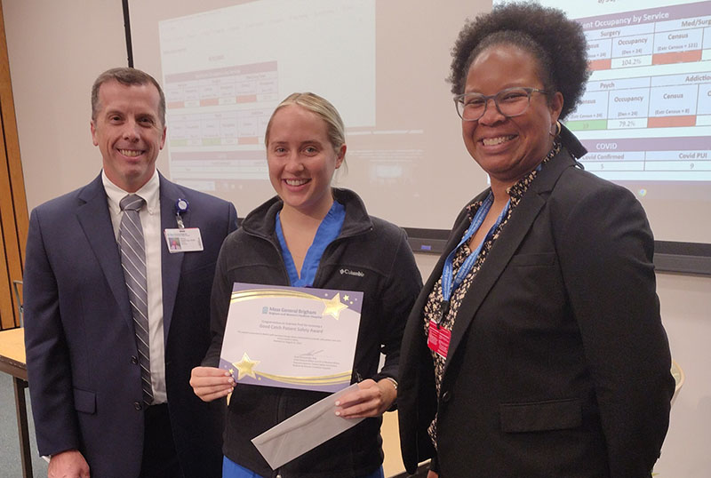 Sonographer Gabriele Preli standing with Brian McIntosh and Andrea Shellman